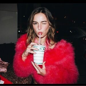 Red faux fur coat